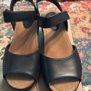 Black Bussola wedge sandals